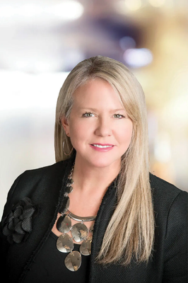 Portrait of Megan Miller-Minderlein, REALTOR® | NRLUX